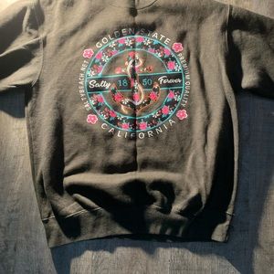 Dark grey pull over, with anchor graphic design